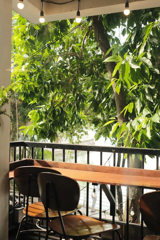 Two traditional chairs on a balcony representing Levantine Heritage and deep INFJ connections.